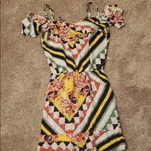 Beautiful Dress with unique designs. Perfect for summer cookouts.